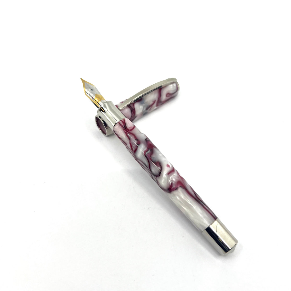 Visconti Opera Fountain Pen with Burgundy Streaking on Lustrous White Backdrop - Medium 14kt Gold Nib