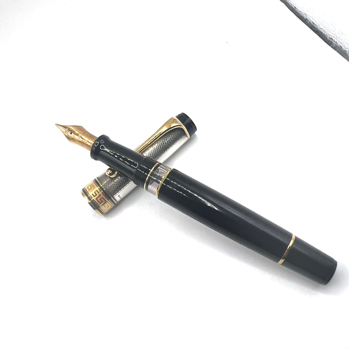 Aurora Optima Sterling Silver Guilloche Cap/Black Resin Barrel Fountain Pen - Medium 14kt Gold Nib