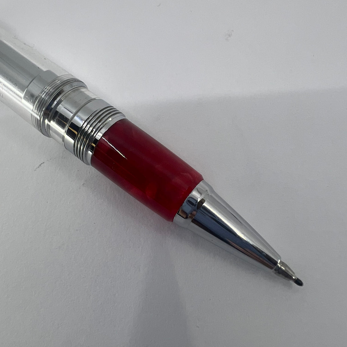 Aurora Optima Transparent Demonstrator Limited Edition Rollerball with Red Auroroloid Highlights