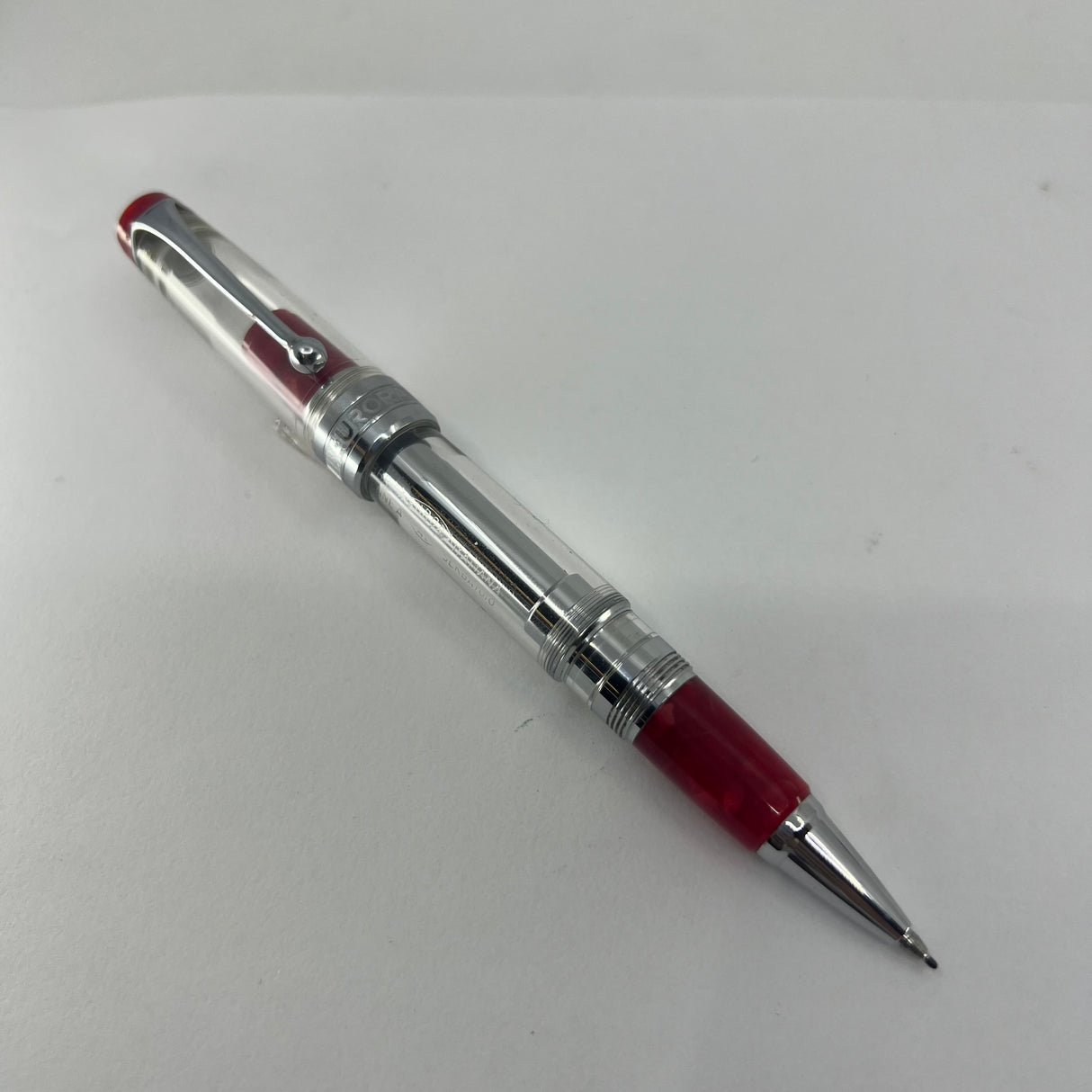 Aurora Optima Transparent Demonstrator Limited Edition Rollerball with Red Auroroloid Highlights