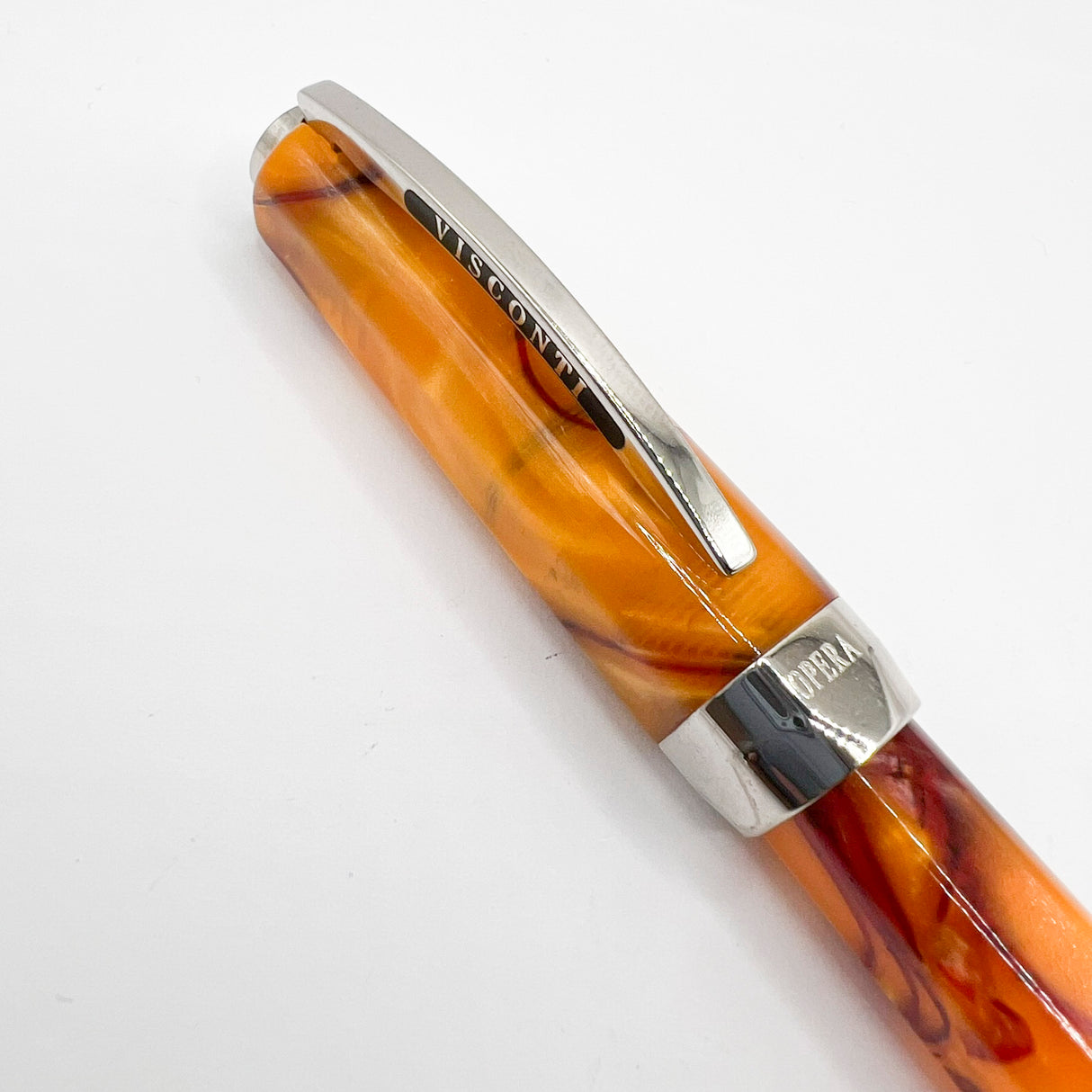 Visconti Opera Fountain Pen with Burgundy Streaking on Amber Backdrop - Medium 14kt Gold Nib