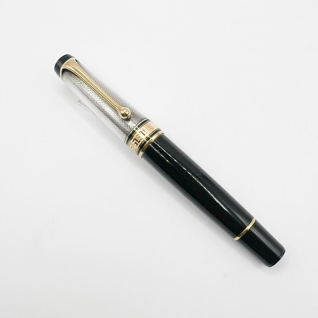 Aurora Optima Black Resin/Sterling Silver Guilloche Cap Fountain Pen - Fine 14kt Gold Nib