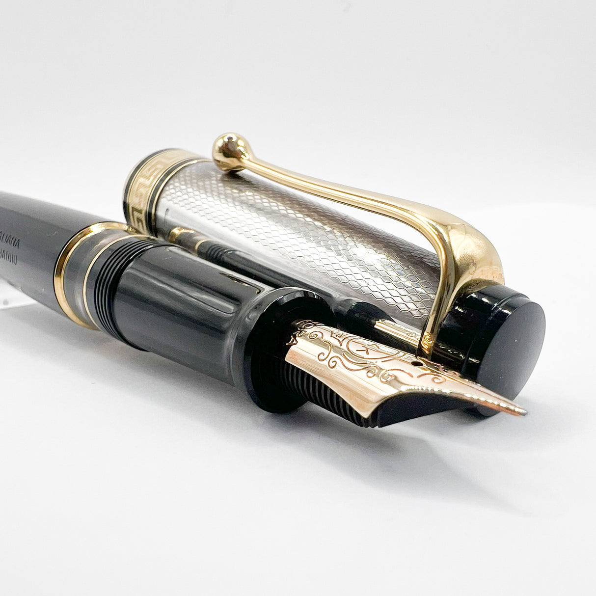 Aurora Optima Black Resin/Sterling Silver Guilloche Cap Fountain Pen - Fine 14kt Gold Nib
