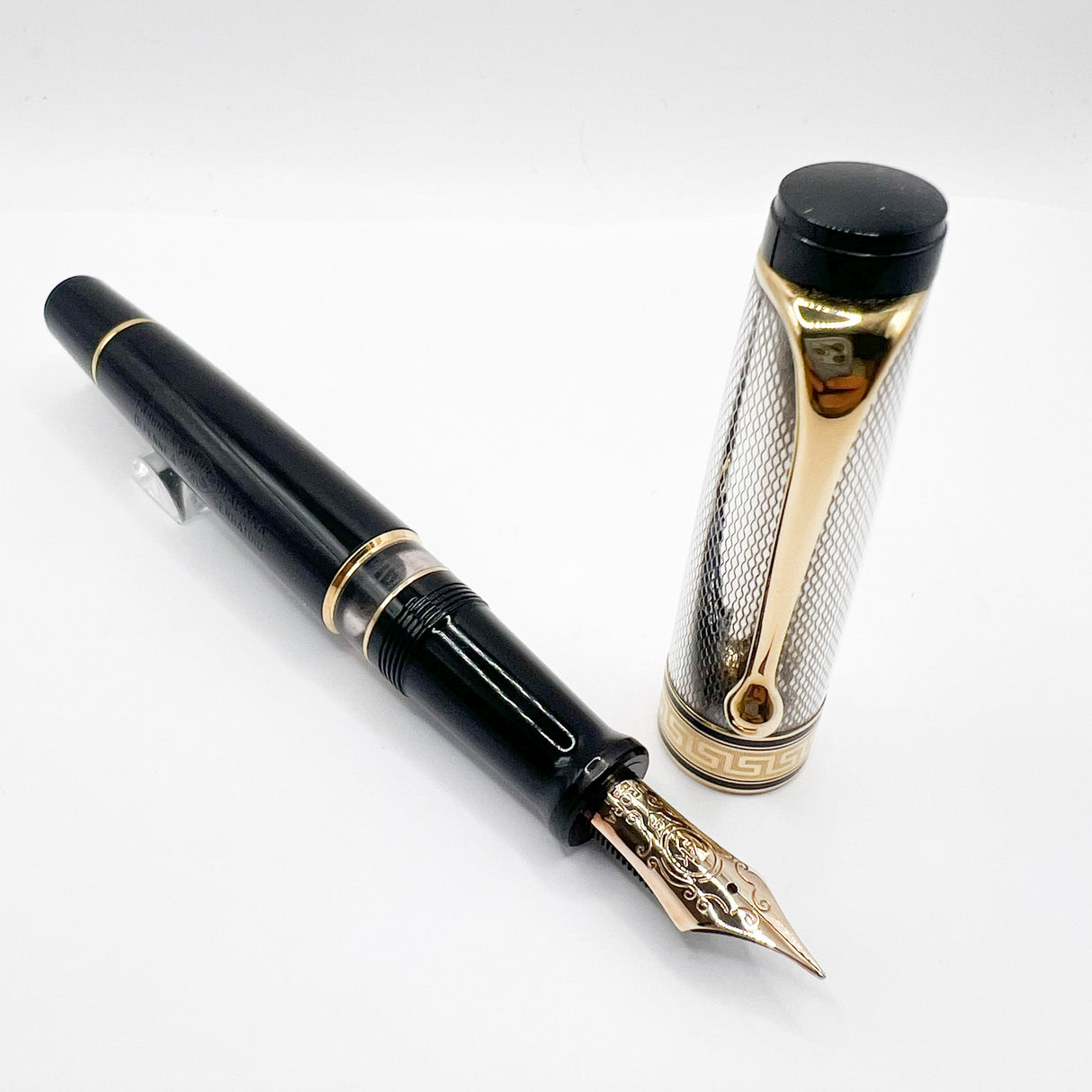Aurora Optima Black Resin/Sterling Silver Guilloche Cap Fountain Pen - Fine 14kt Gold Nib