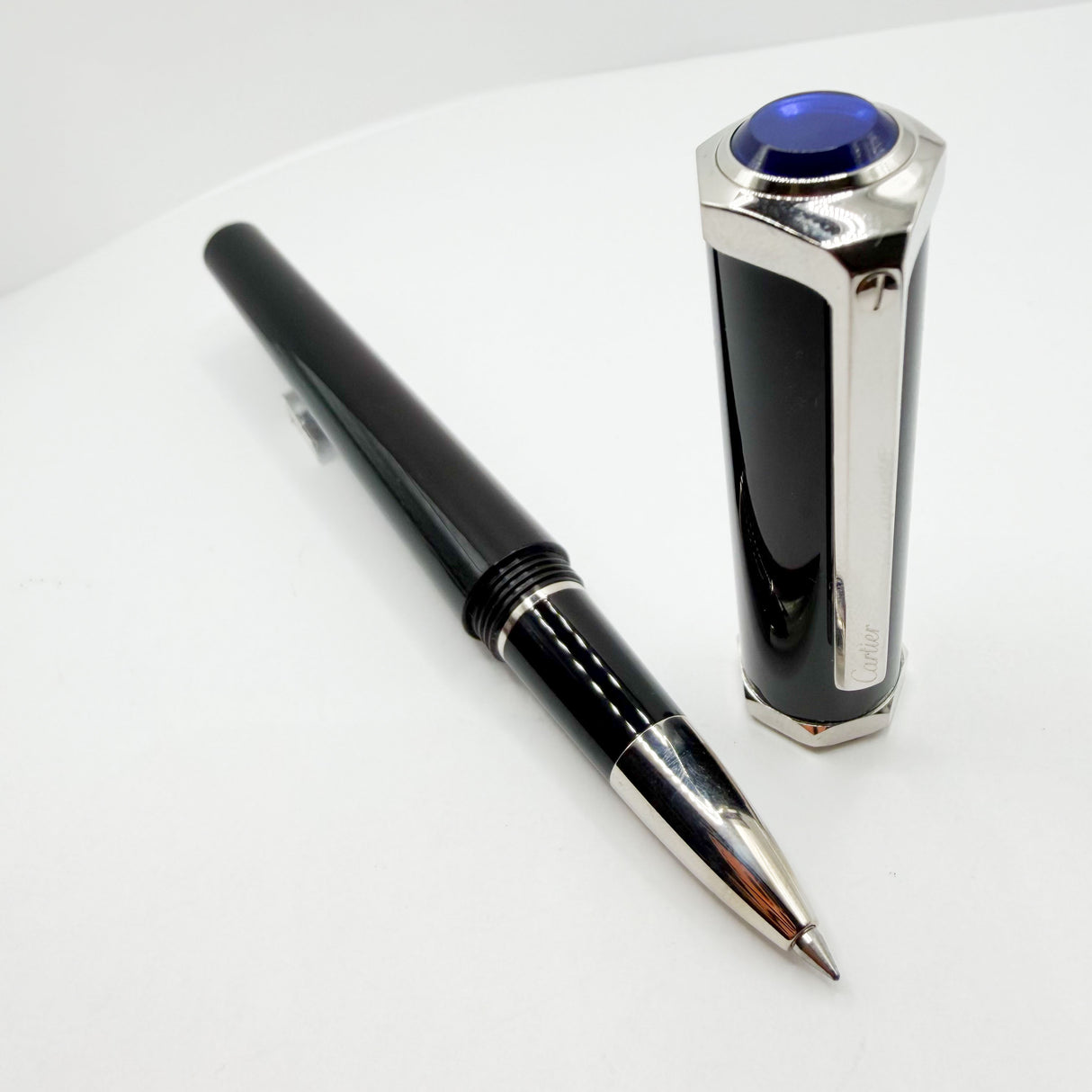 Cartier Santos-Dumont Black Composite Rollerball featuring a Distinctive Palladium-Finish Screwed Bezel Design