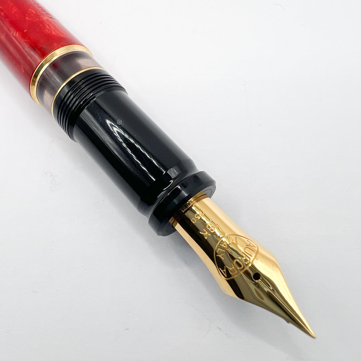 Aurora 75th Anniversary Optima Red Marble Auroloide Limited Edition Fountain Pen - Extra Fine 18kt Gold Nib