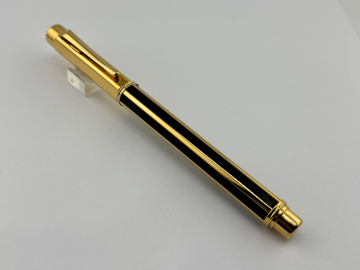 Caran D'ache Varius "Laque de Chine" Black and Gold Facetted Fountain Pen - Medium 18kt Gold Nib