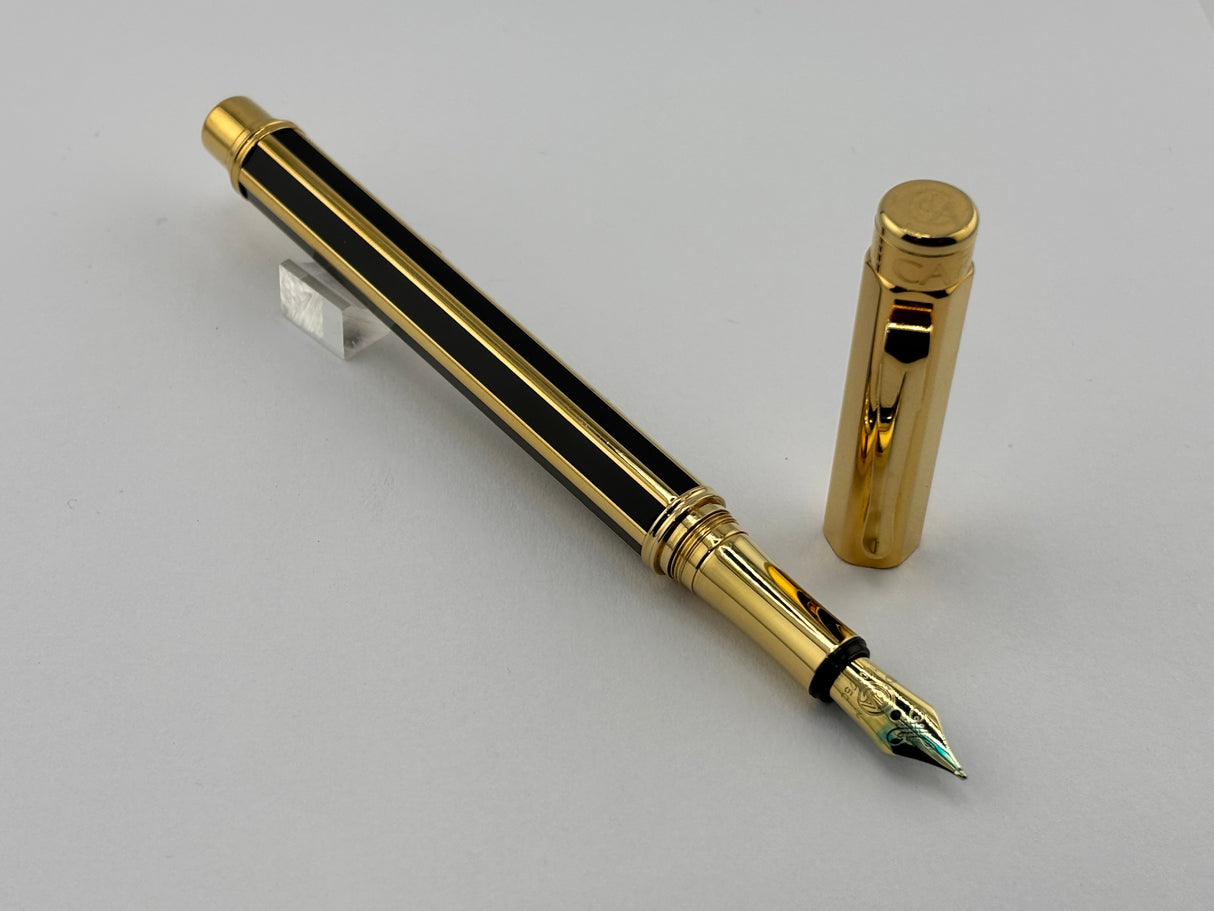 Caran D'ache Varius "Laque de Chine" Black and Gold Facetted Fountain Pen - Medium 18kt Gold Nib