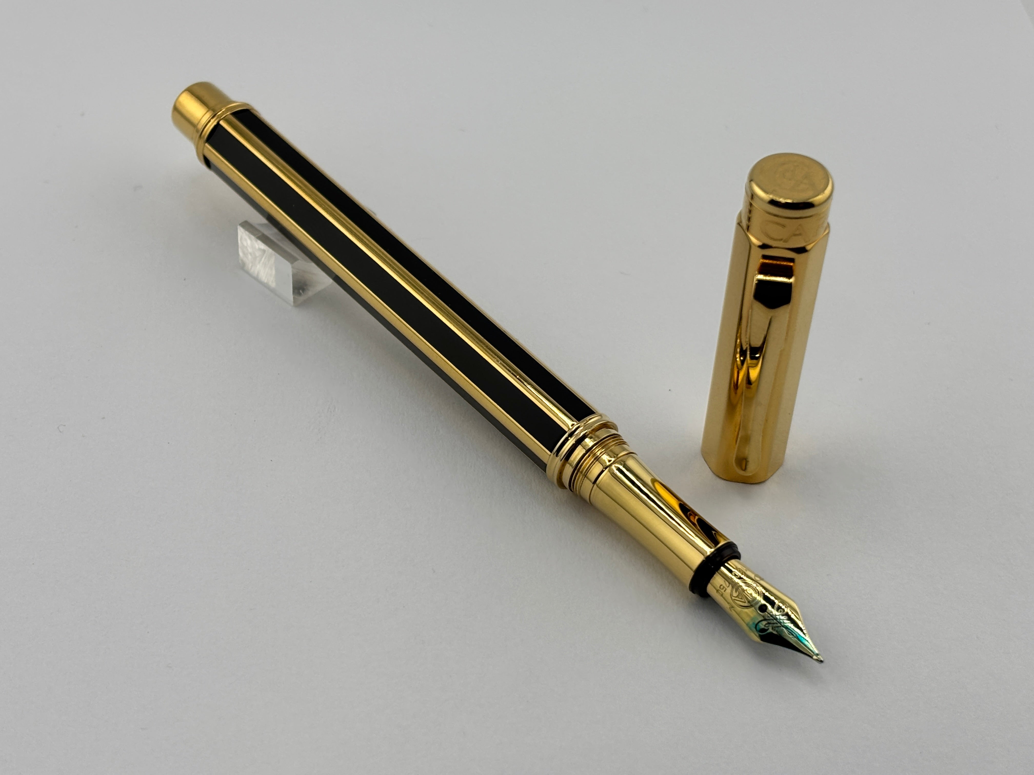 Caran D'ache Varius "Laque de Chine" Black and Gold Facetted Fountain Pen - Medium 18kt Gold Nib