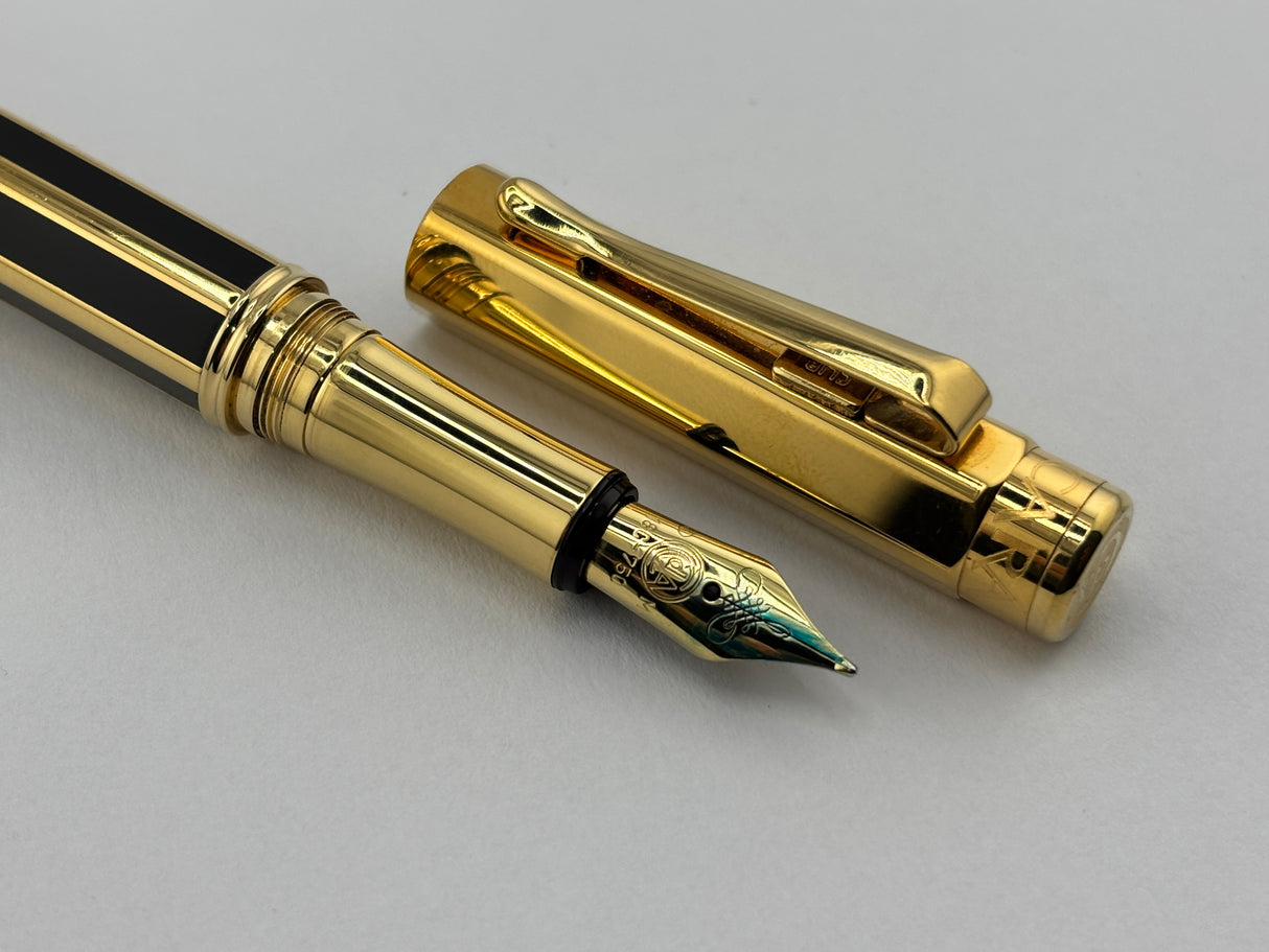 Caran D'ache Varius "Laque de Chine" Black and Gold Facetted Fountain Pen - Medium 18kt Gold Nib