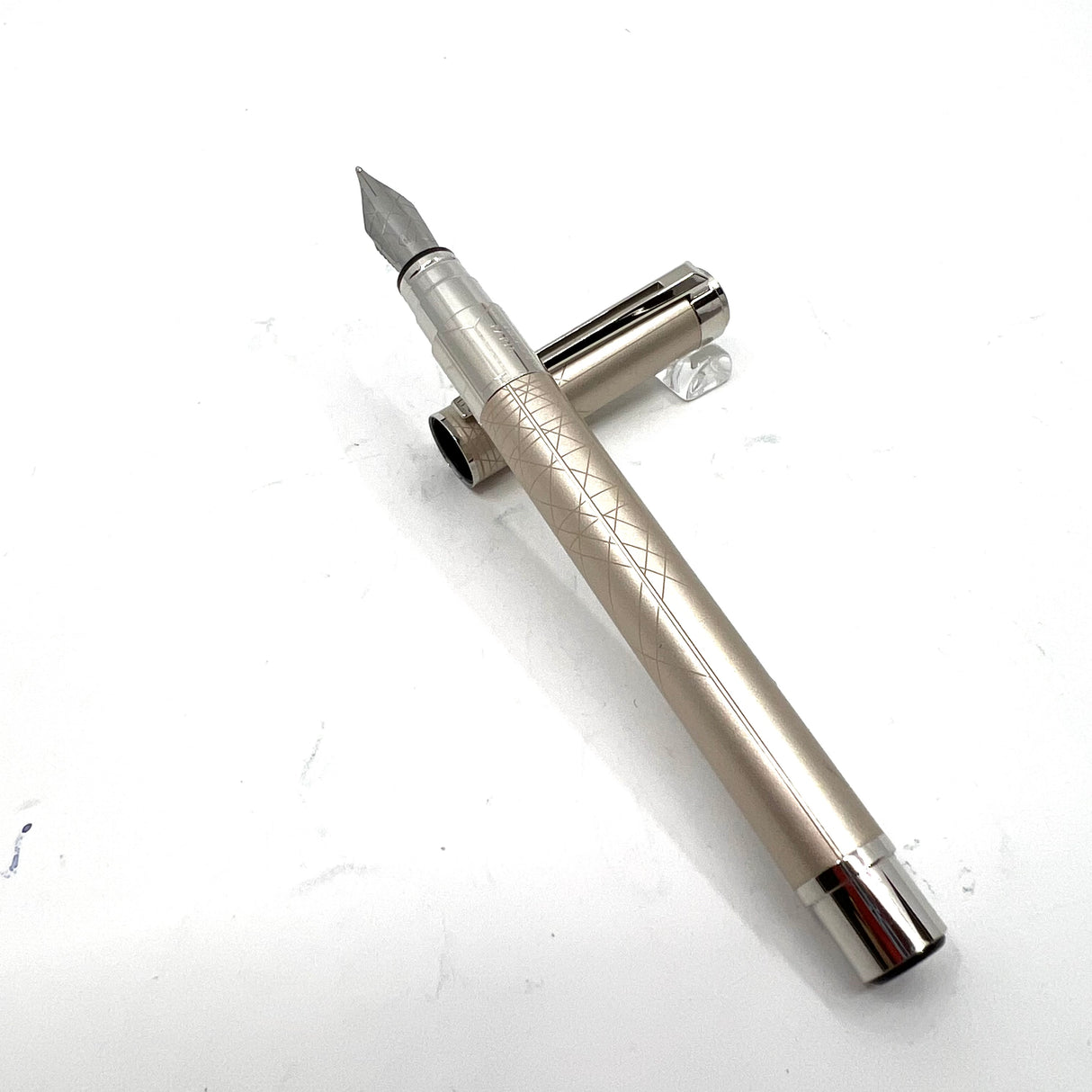 Waterman Silver Tone Perspective Fountain Pen with a Line Design at Different Angles