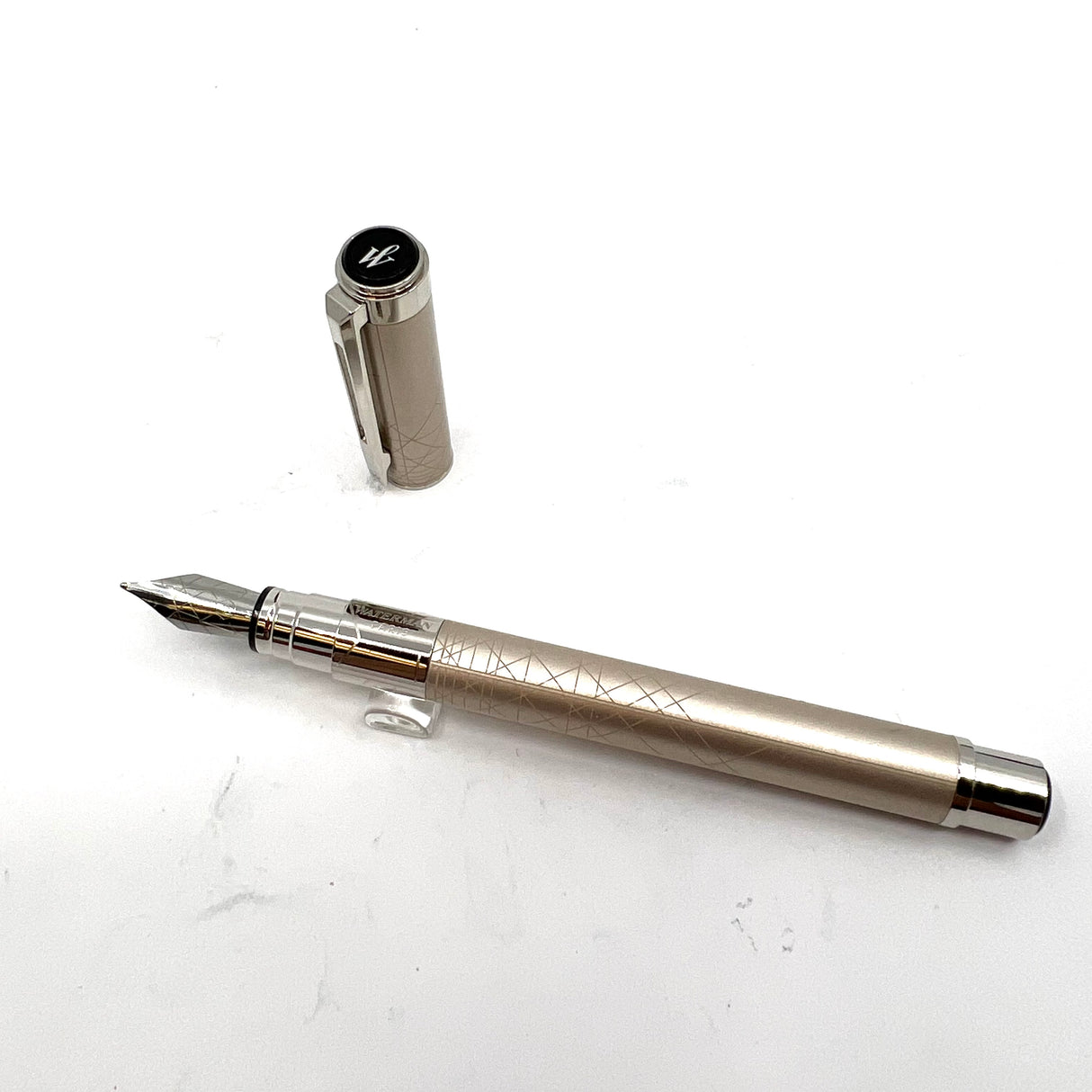 Waterman Silver Tone Perspective Fountain Pen with a Line Design at Different Angles