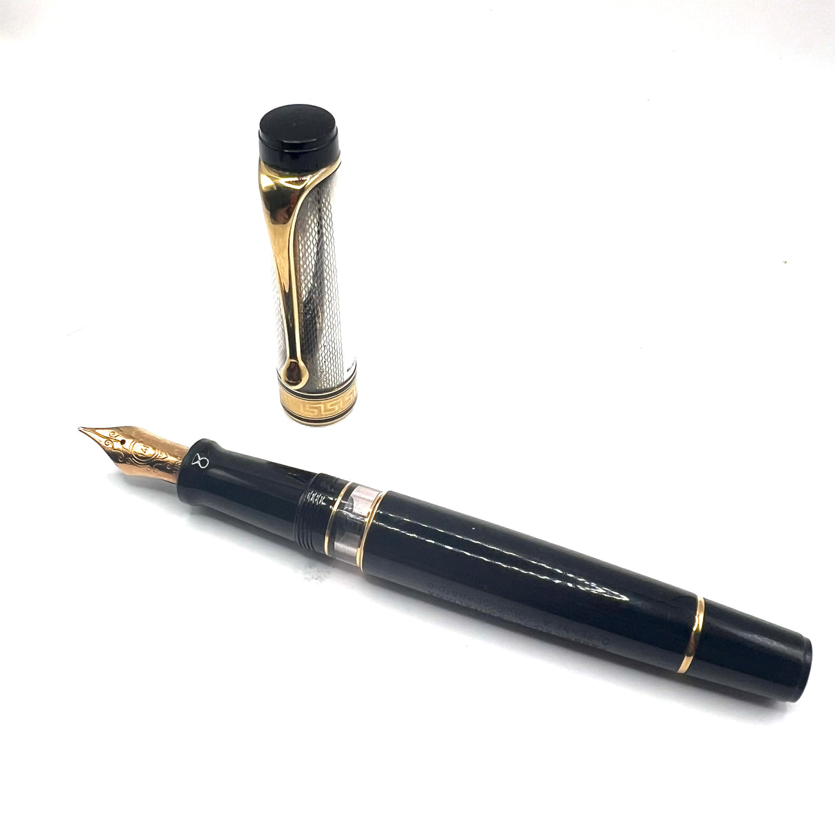 Aurora Optima Sterling Silver Guilloche Cap/Black Resin Barrel  Fountain Pen -  Medium 14kt Gold Nib