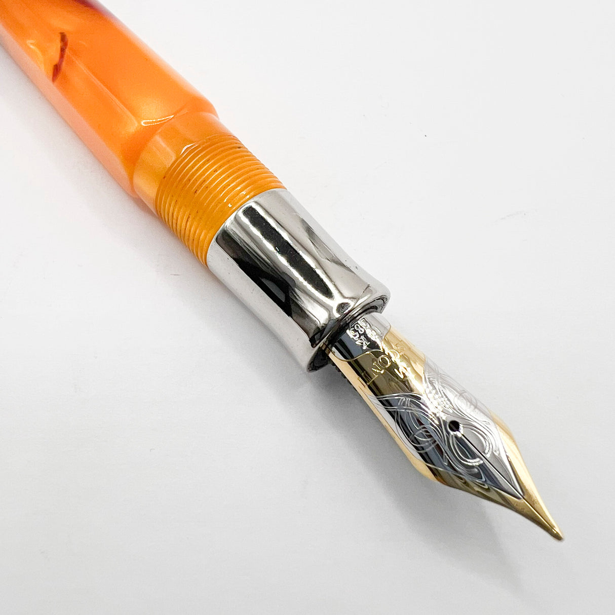 Visconti Opera Fountain Pen with Burgundy Streaking on Amber Backdrop - Medium 14kt Gold Nib