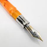 Visconti Opera Fountain Pen with Burgundy Streaking on Amber Backdrop - Medium 14kt Gold Nib
