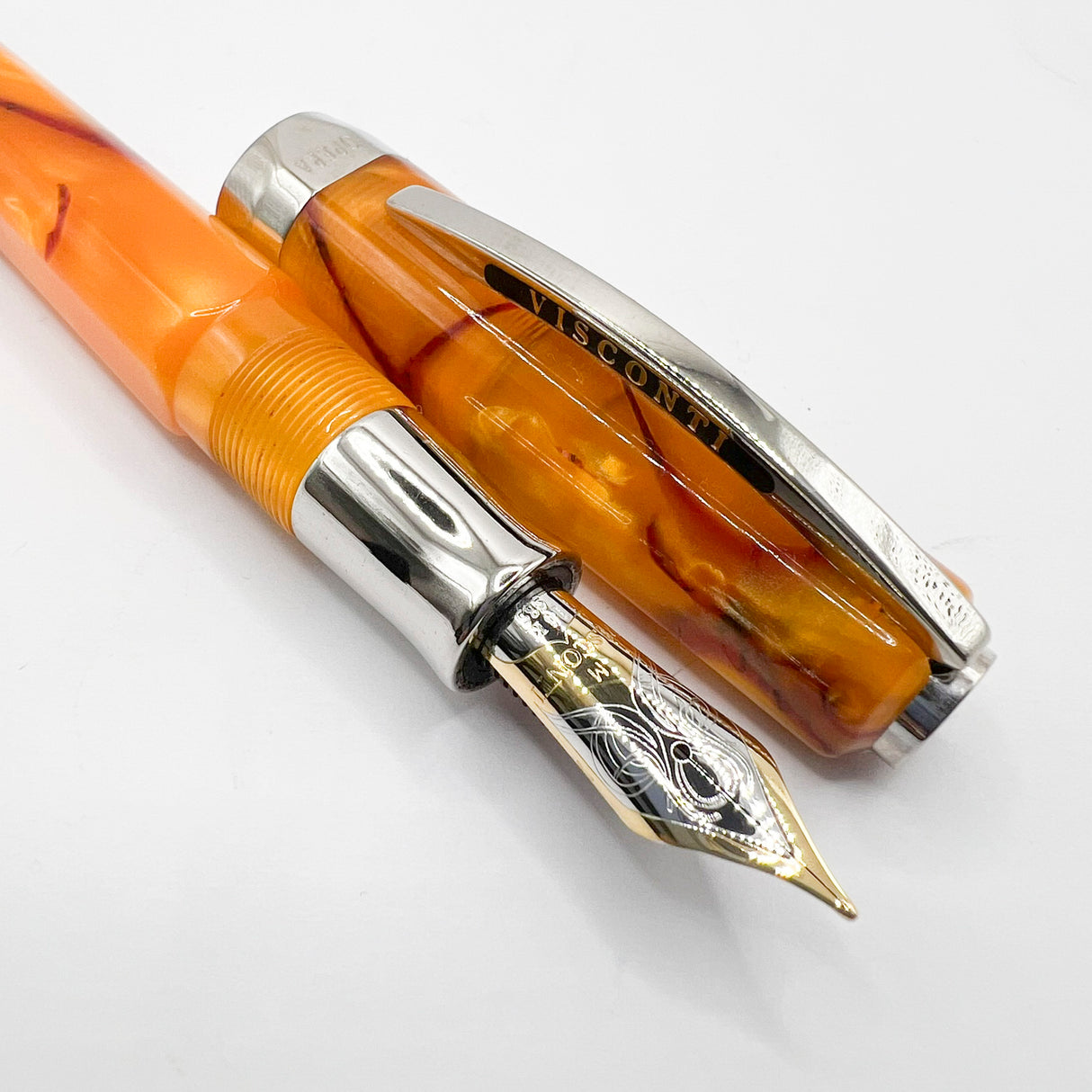 Visconti Opera Fountain Pen with Burgundy Streaking on Amber Backdrop - Medium 14kt Gold Nib