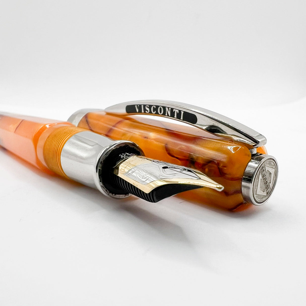 Visconti Opera Fountain Pen with Burgundy Streaking on Amber Backdrop - Medium 14kt Gold Nib