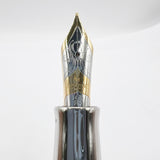 Visconti Opera Fountain Pen with Burgundy Streaking on Amber Backdrop - Medium 14kt Gold Nib