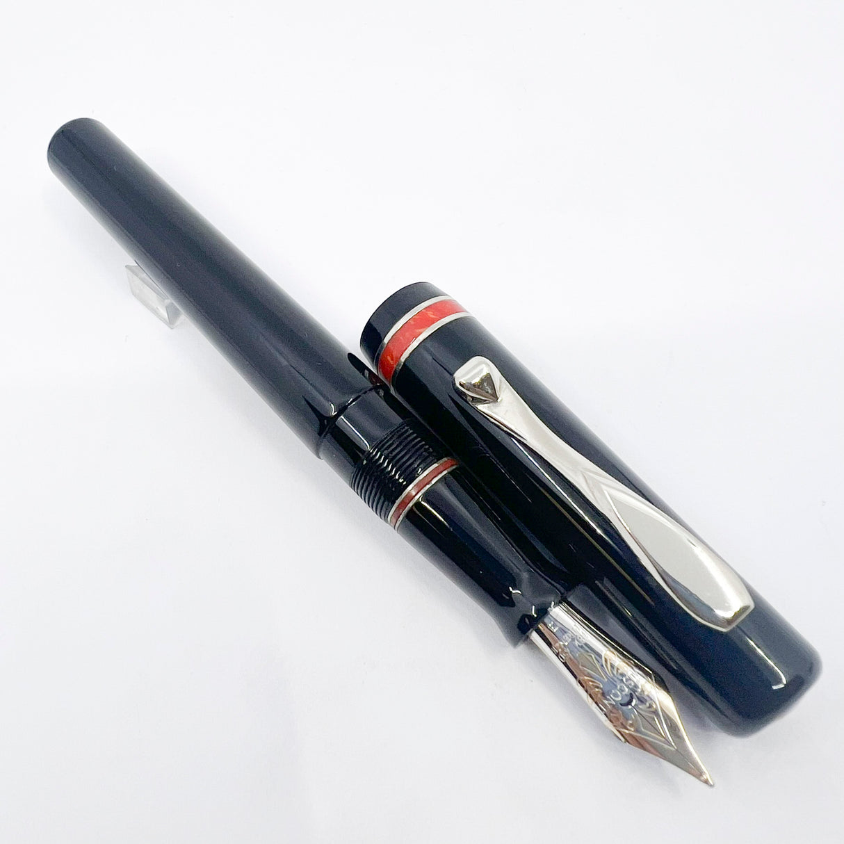 Visconti Glossy Black Resin Midnight Voyager Fountain  Pen - Two Rings of Coral Celluloid - Broad 18kt Gold Nib