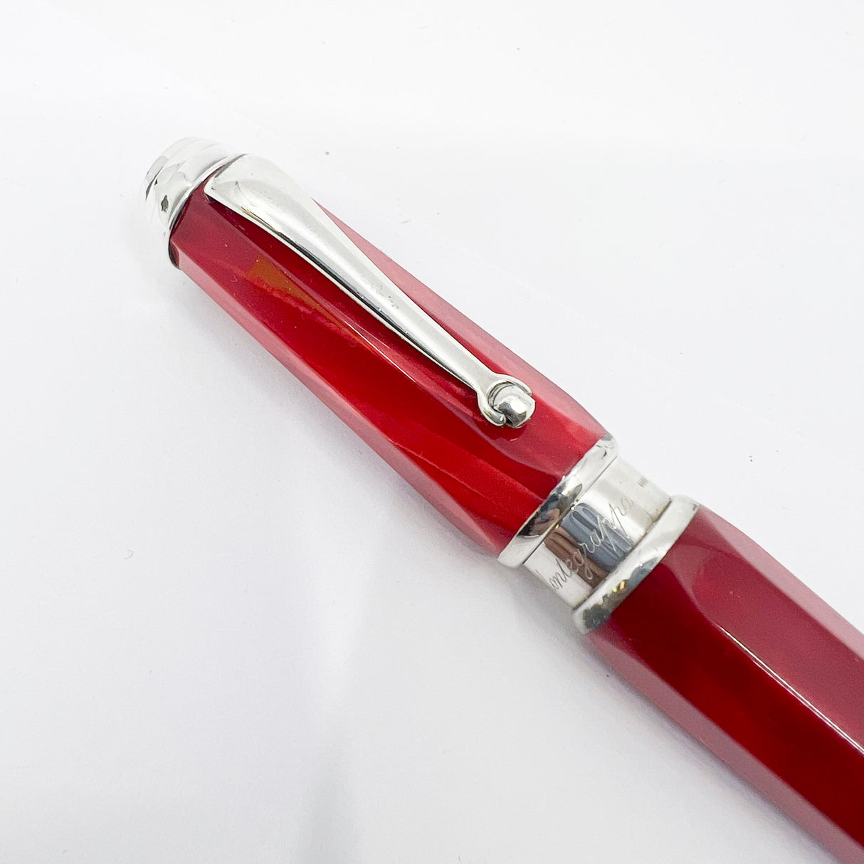Montegrappa Espressione  Lustrous Red Celluloid Facetted Ballpoint Pen - Sterling Silver Clip and Trim