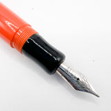Delta #366 Fountain Pen - Black Cap/Orange Barrel -  Medium 18kt Gold Nib