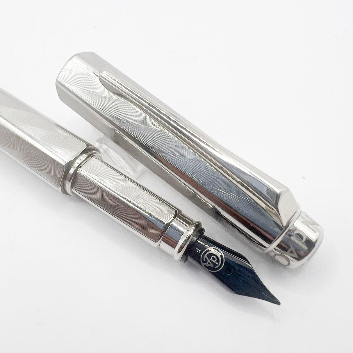 Caran D'ache RNX.316 Lazer Engraved Stainless Steel Fountain Pen -  PVD Blackened Stainless Steel Fine Nib