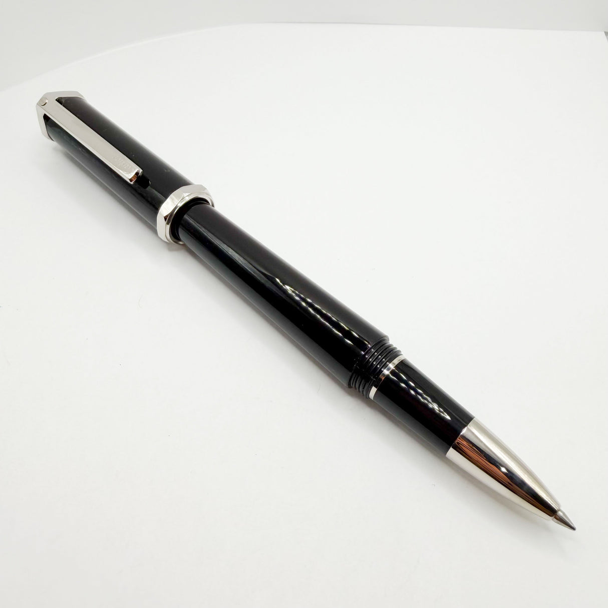 Cartier Santos-Dumont Black Composite Rollerball featuring a Distinctive Palladium-Finish Screwed Bezel Design