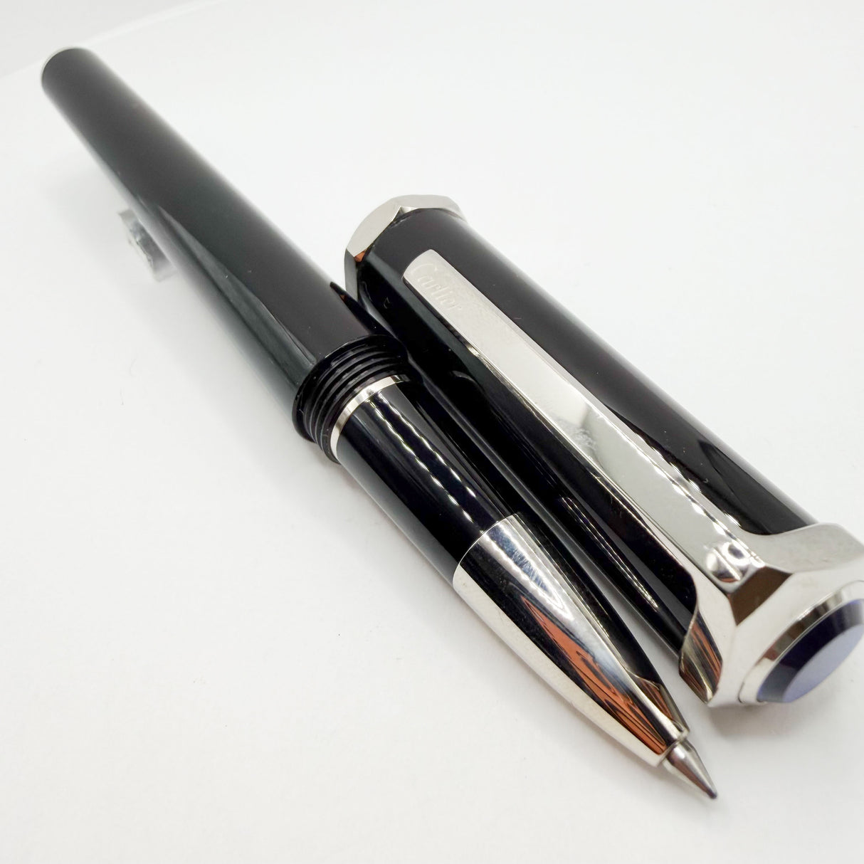 Cartier Santos-Dumont Black Composite Rollerball featuring a Distinctive Palladium-Finish Screwed Bezel Design