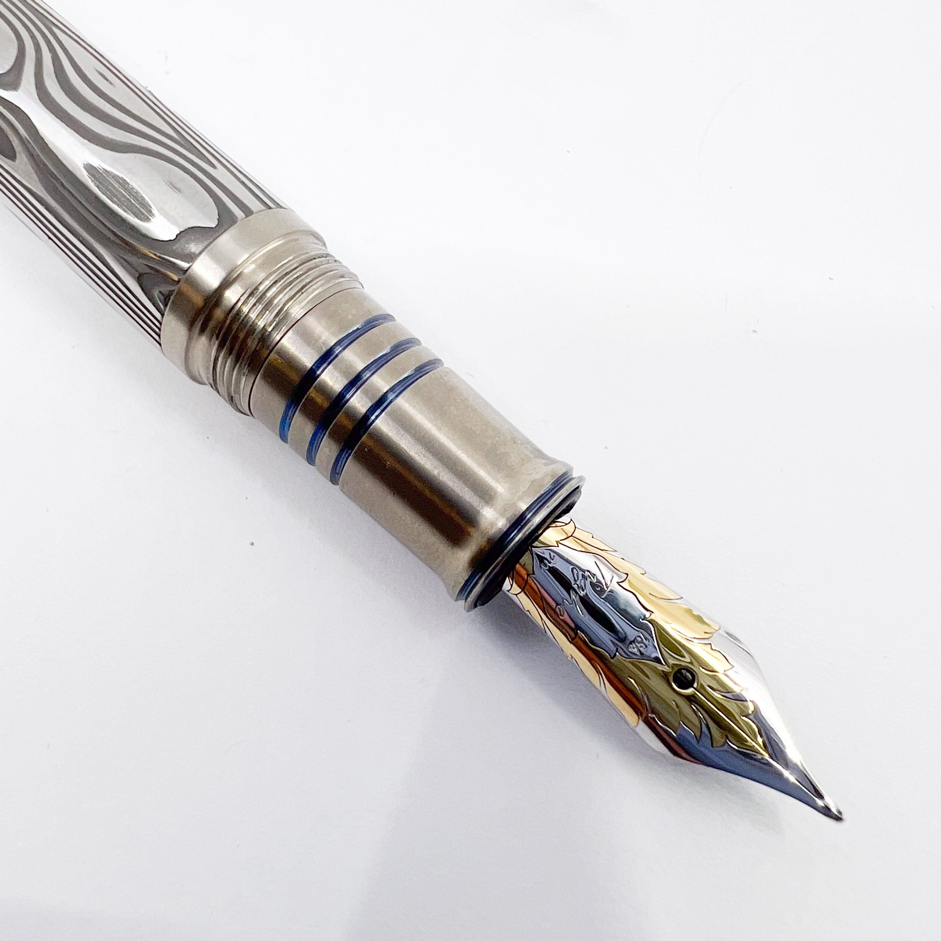 Grayson Tighe Odin's Eye Damascus Steel over Titanium Limited
