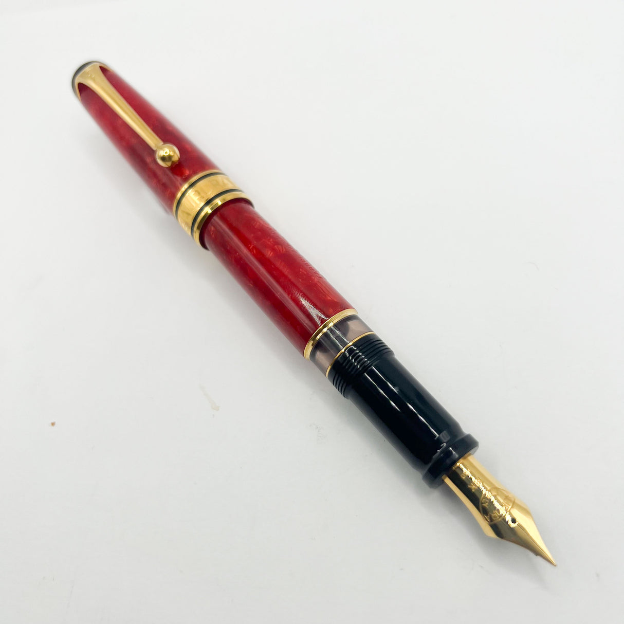 Aurora 75th Anniversary Optima Red Marble Auroloide Limited Edition Fountain Pen - Extra Fine 18kt Gold Nib