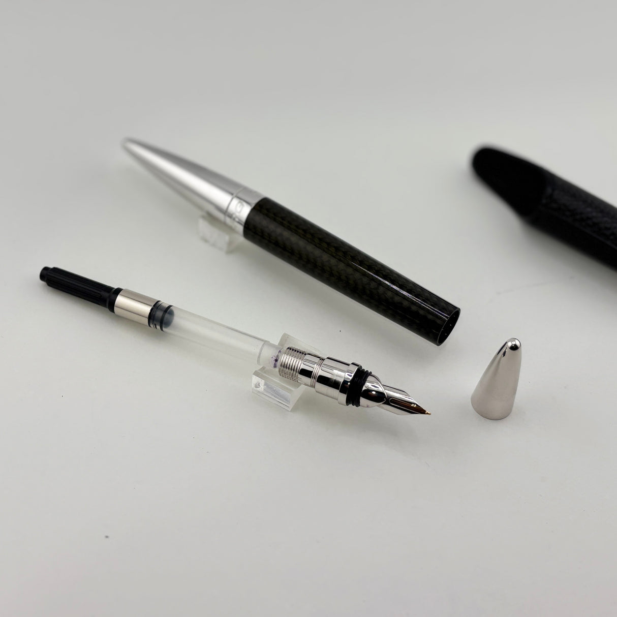 Jorg Hysek Fountain Pen - Carbon Fiber &  Rhodium Plating -  Medium 18kt Gold Nib