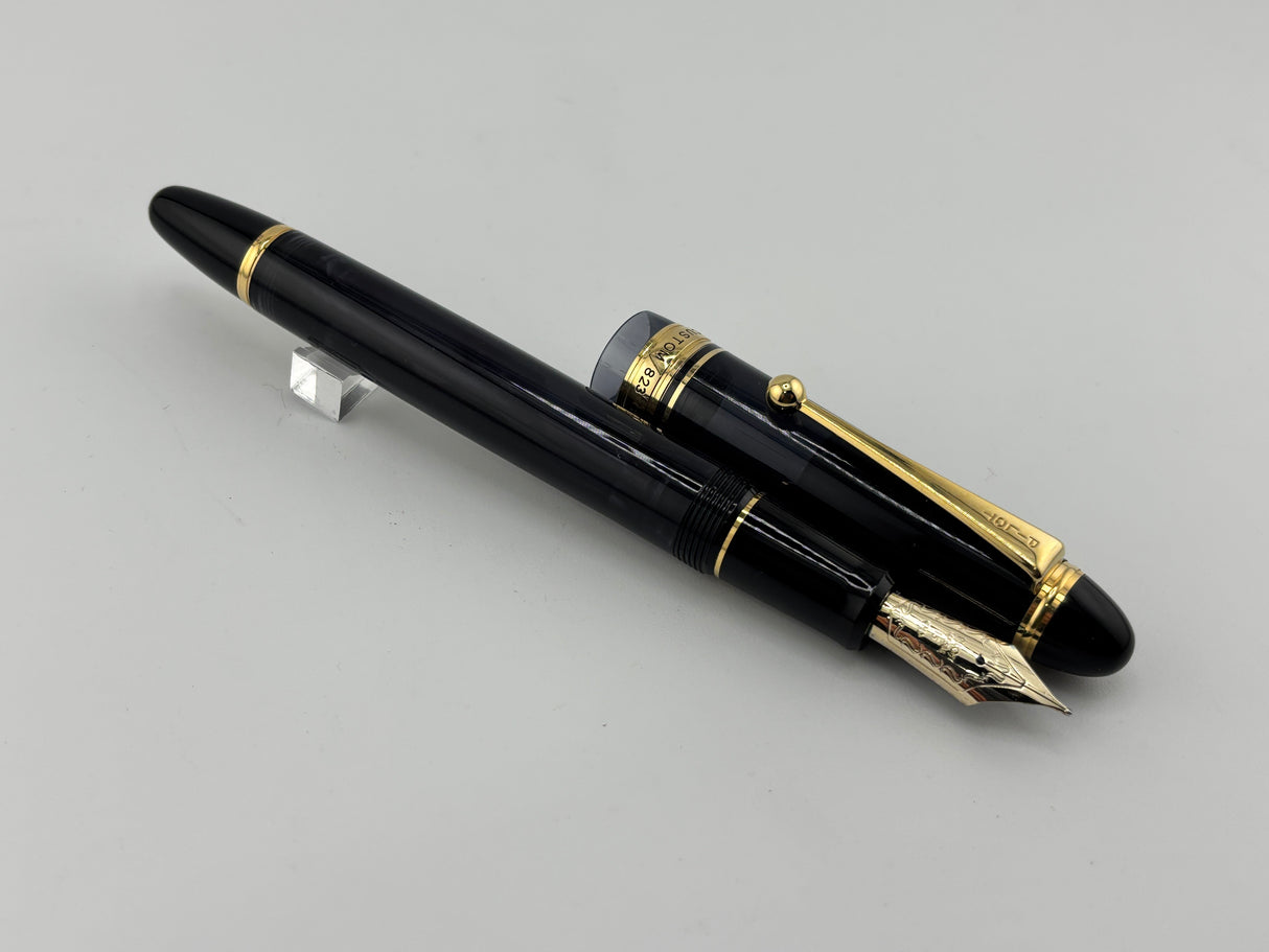 Pilot Custom 823 Black Smoke Gold Trim Piston filler - Medium 14K Nib