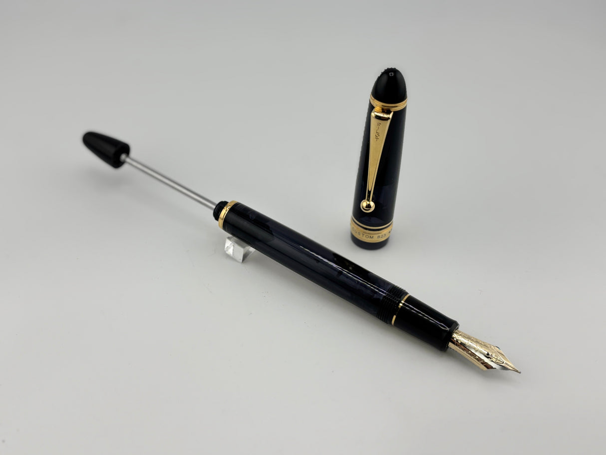 Pilot Custom 823 Black Smoke Gold Trim Piston filler - Medium 14K Nib