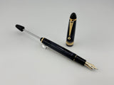 Pilot Custom 823 Black Smoke Gold Trim Piston filler - Medium 14K Nib