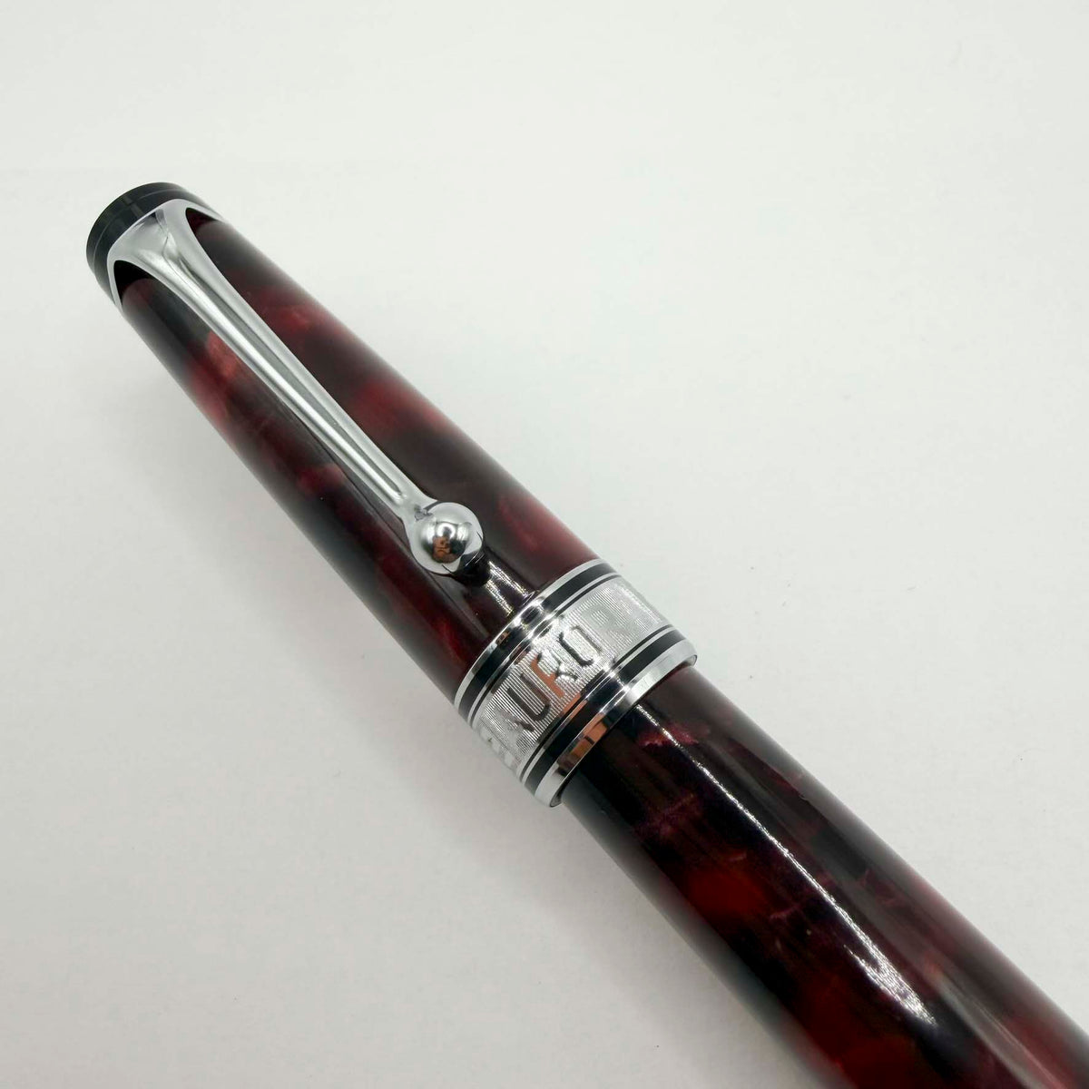 Aurora Optima  Marbled Burgundy Auroloide Fountain Pen -  Fine 14kt Gold Nib